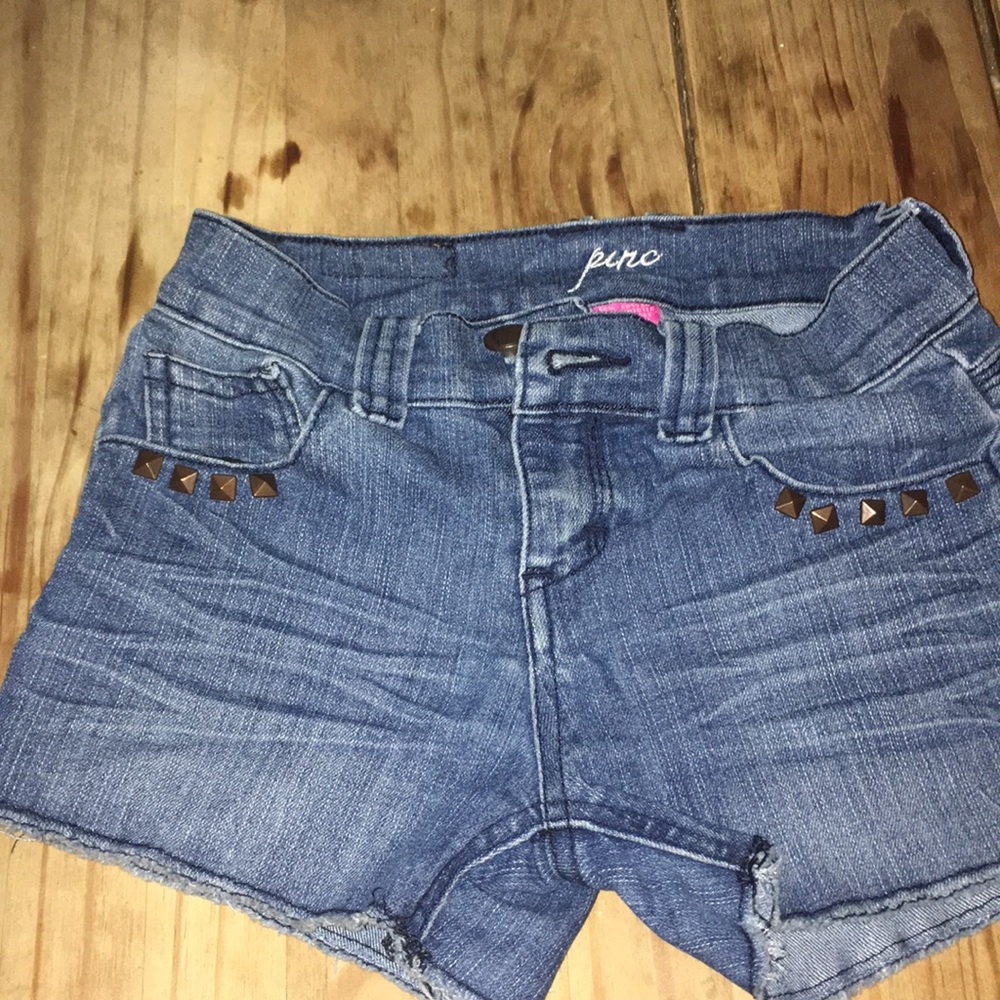 Girls studded jean shorts. Worn for one season.